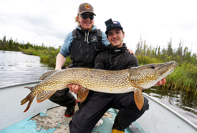 Guy with Pike at Misaw Lake Lodge